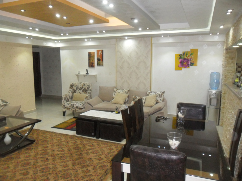 شقة فندقية فى المهندسين محى الدين أبو العز للإيجار